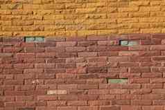 特写镜头色彩斑斓的现代砖墙纹理