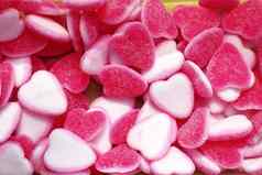 果冻糖果糖果粉红色的白色心形状