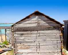 灰色的木小屋房子Formentera海滩