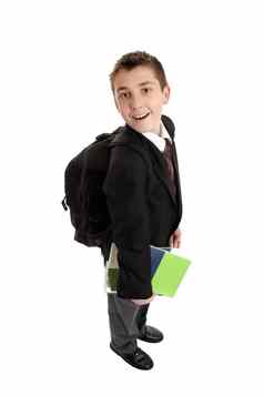 高学校男孩携带袋书