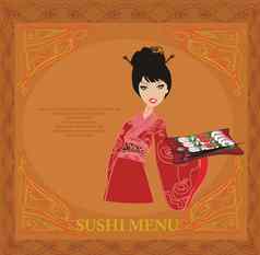 甜蜜的亚洲女孩享受寿司