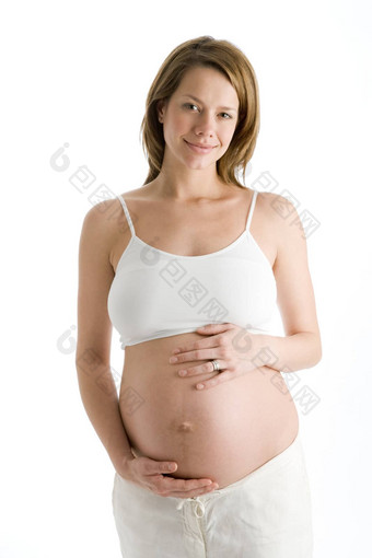 怀孕了女人持有暴露肚子笑