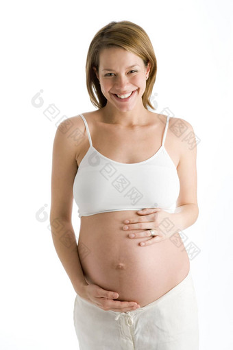 怀孕了女人持有暴露肚子笑