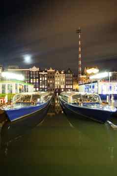 阿姆斯特丹晚上游览船旋转达姆拉克街