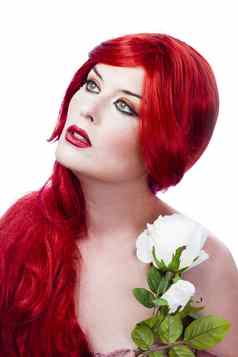 美丽的红色的头发的新鲜的花手春天浓缩的
