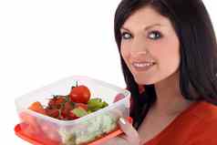 女人塑料午餐盒子新鲜的蔬菜