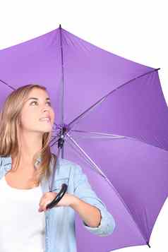 年轻的女人紫色的伞