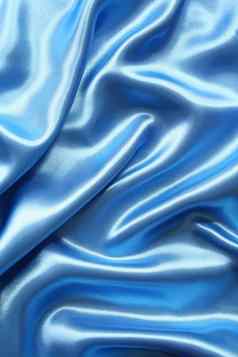 光滑的优雅的黑暗蓝色的丝绸