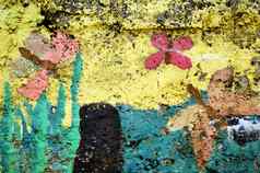混凝土墙色彩斑斓的油漆蝴蝶