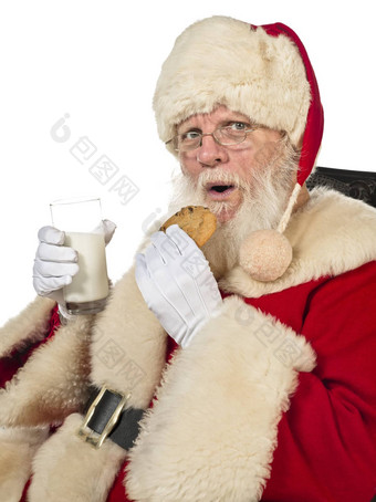 圣诞老人老人喝牛奶吃饼干