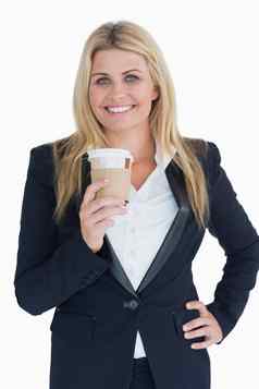 业务女人持有咖啡杯