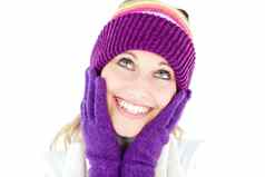快乐的年轻的女人帽手套冬天