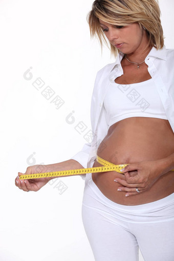 怀孕了女人测量磁带