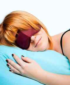睡觉年轻的女人睡眠眼睛面具