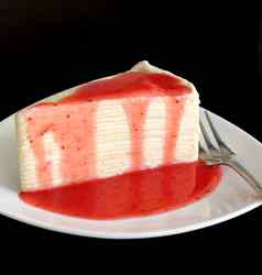 黑纱蛋糕草莓酱汁一流的白色板