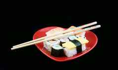 寿司黑色的背景筷子
