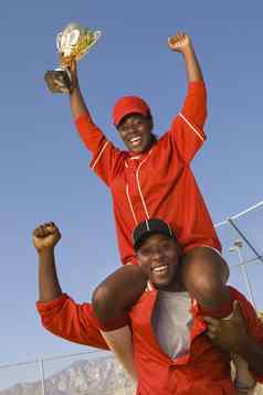 肖像快乐的非洲美国棒球球员奖杯