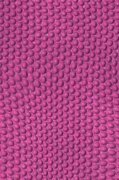 粉红色的python蛇皮肤纹理背景