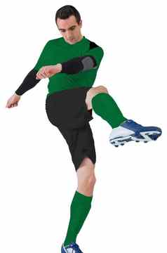 足球球员绿色踢