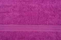 特里淡紫色彩色的布毛巾纹理背景