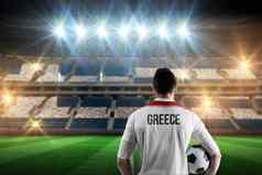 复合图像希腊足球球员持有球