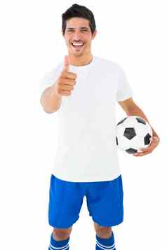 足球球员白色持有球显示拇指