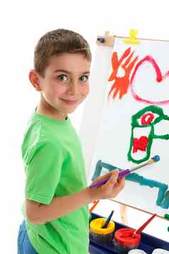 年轻的男孩艺术家绘画画架