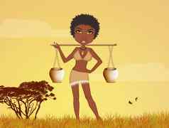 非洲女人携带水日落
