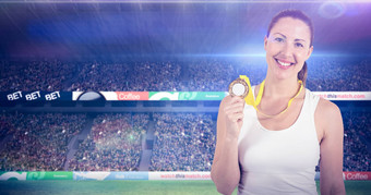 复合图像女运动员摆姿势黄金奖牌胜利