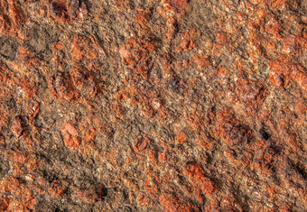 背景红色的花岗岩粗糙的表面