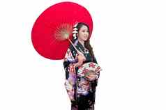 美丽的年轻的亚洲女人穿传统的日本和服红色的伞孤立的白色背景