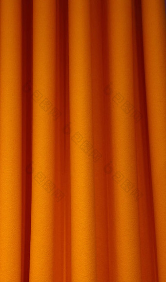 重橙色感觉纺织窗帘褶皱背景