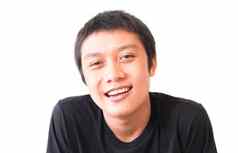 亚洲年轻的男人。微笑快乐感觉字符白色