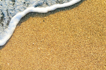 夏天海滩背景海波沙子旅行假期概念