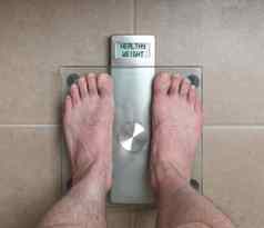 男人的脚重量规模健康的重量