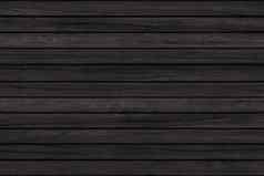 木纹理背景黑色的木墙小时地板上