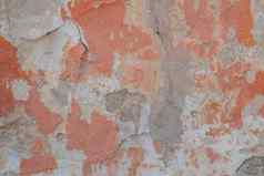 裂缝石膏墙芯片油漆红色的纹理背景