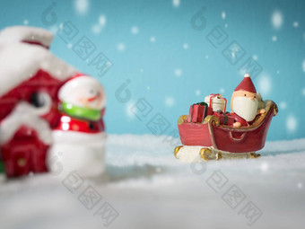 快乐圣诞老人老人礼物盒子雪雪橇雪<strong>房子</strong>雪<strong>房子雪人</strong>圣诞节<strong>树</strong>圣诞老人老人雪<strong>房子</strong>雪背景粉蓝色的