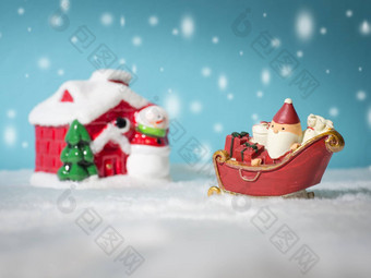 快乐圣诞老人老人礼物盒子雪雪橇雪<strong>房子</strong>雪<strong>房子雪人</strong>圣诞节树圣诞老人老人雪<strong>房子</strong>雪背景粉蓝色的