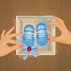 蓝色的婴儿鞋子礼物盒子