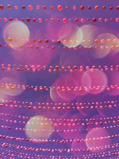 紫色的天空背景气球装饰散景灯