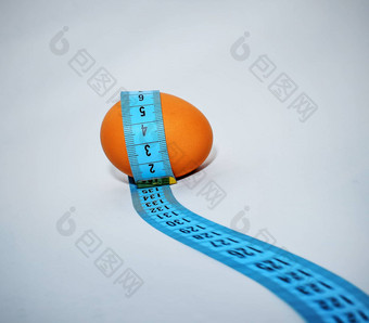 蛋包装蓝色的测量磁带<strong>减肥</strong>概念