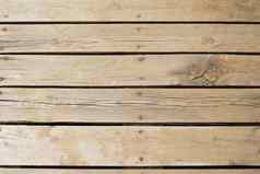 真正的木地板上把指甲触摸自然很容易木背景纹理