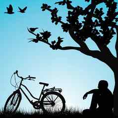 放松骑自行车树