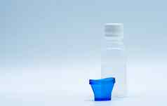 无菌眼睛乳液白色塑料瓶蓝色的洗眼杯复制空间空白标签眼睛洗联系污染环境游泳氯污染池