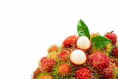特写镜头新鲜的红色的成熟的红毛丹Nephelium近10叶子孤立的白色背景泰国甜点甜蜜的水果热带水果