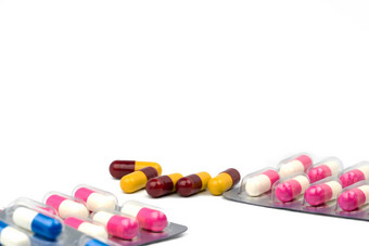 色彩斑斓的抗生素胶囊药片白色背景药物电阻复制空间制药行业药店背景