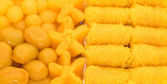 集泰国传统的甜点使蛋蛋黄金线程是丁字裤模拟杰克水果种子与khanoon甜蜜的蛋蛋黄帽丁字裤叫喊声蛋蛋黄福吉球煮熟的糖浆丁字裤哎呀