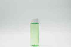 绿色化妆品瓶孤立的白色背景