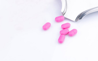 桩粉红色的平板电脑药丸白色背景不锈钢钢药物托盘norfloxacin治疗膀胱炎抗生素药物电阻抗菌药物<strong>合理</strong>的概念